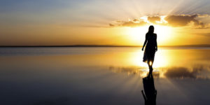 Walking on water at sunset